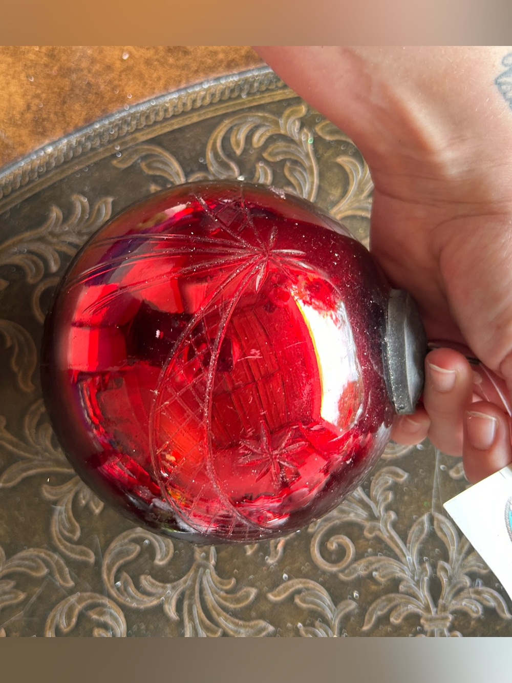 Vintage-Style Red Glass Holiday Ornament with Star Cut Design